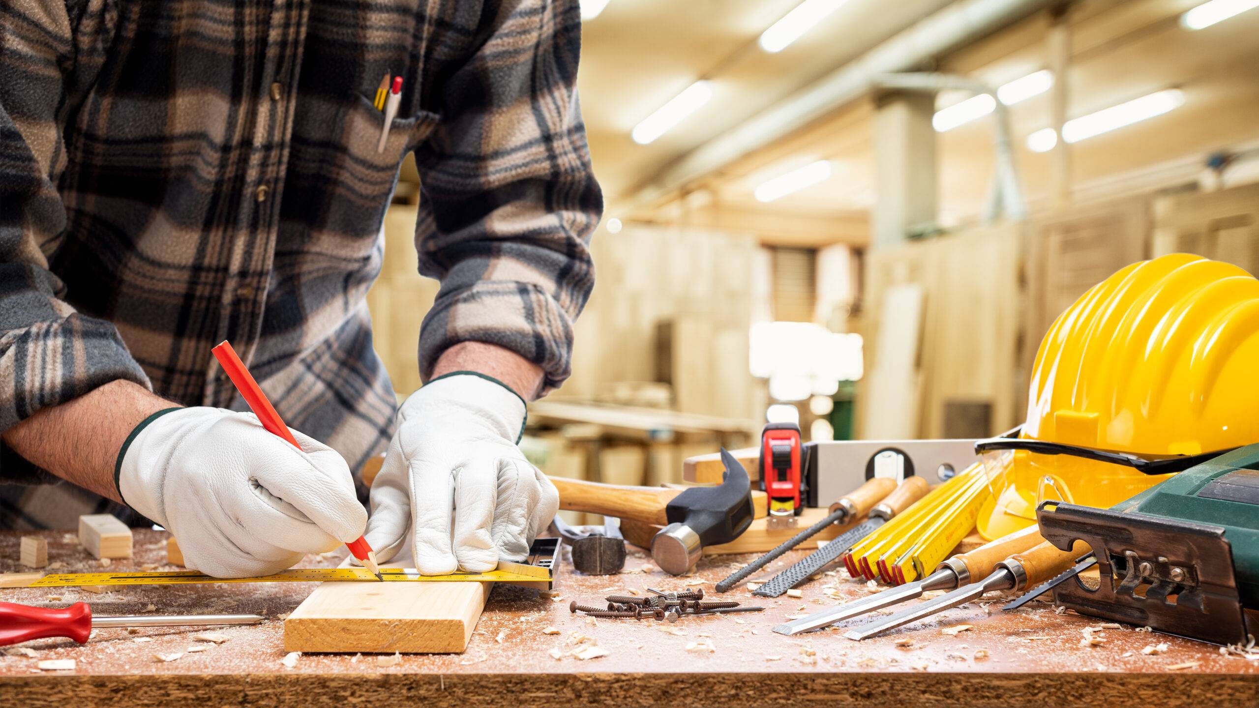 Carpenter At Work On Wooden Boards. Carpentry.